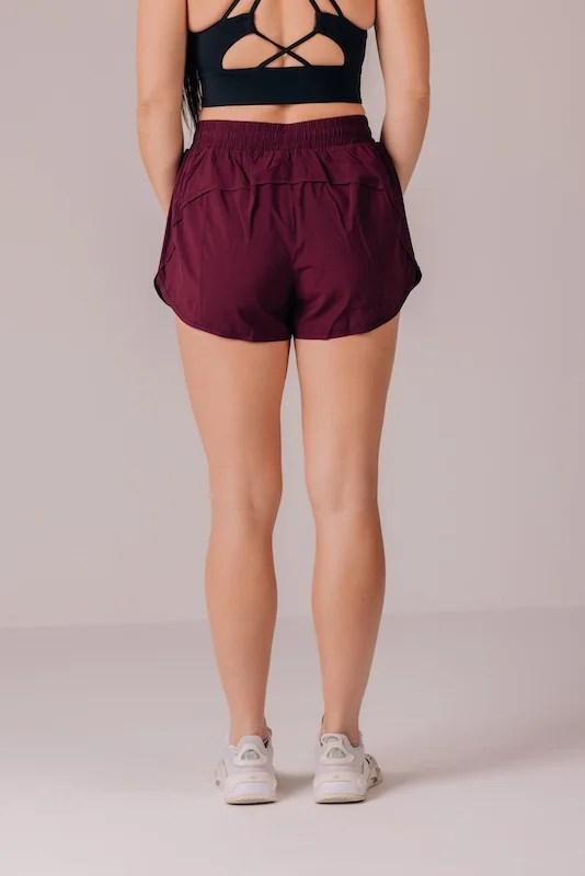 High-waisted burgundy womens shorts back view